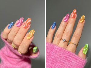 Modelos de Unha em gel com desenhos psicodélicos e cores vibrantes